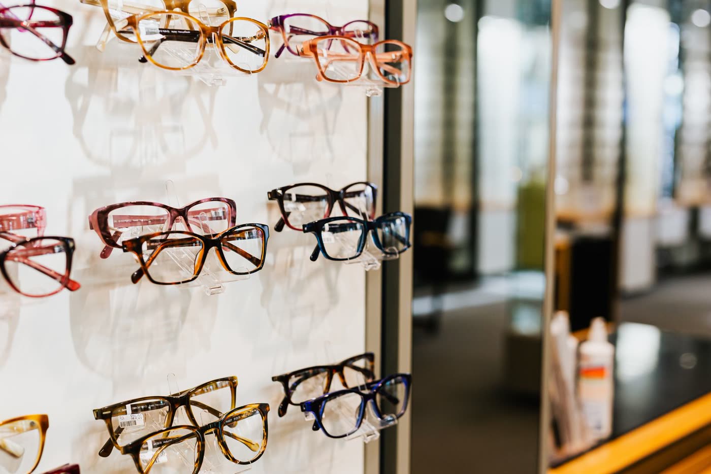 Rows of designer frames on display