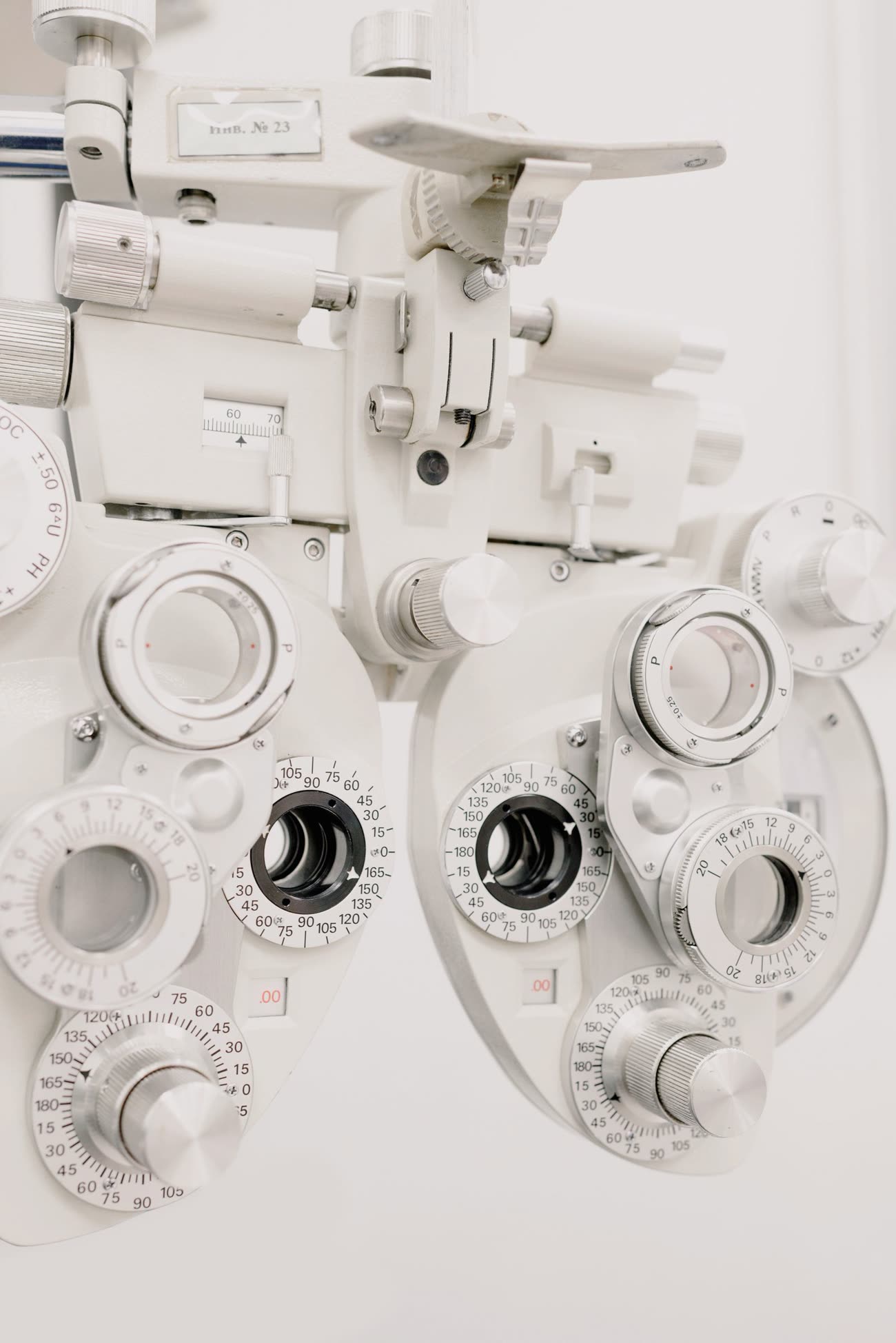 A person having their eyes checked closely